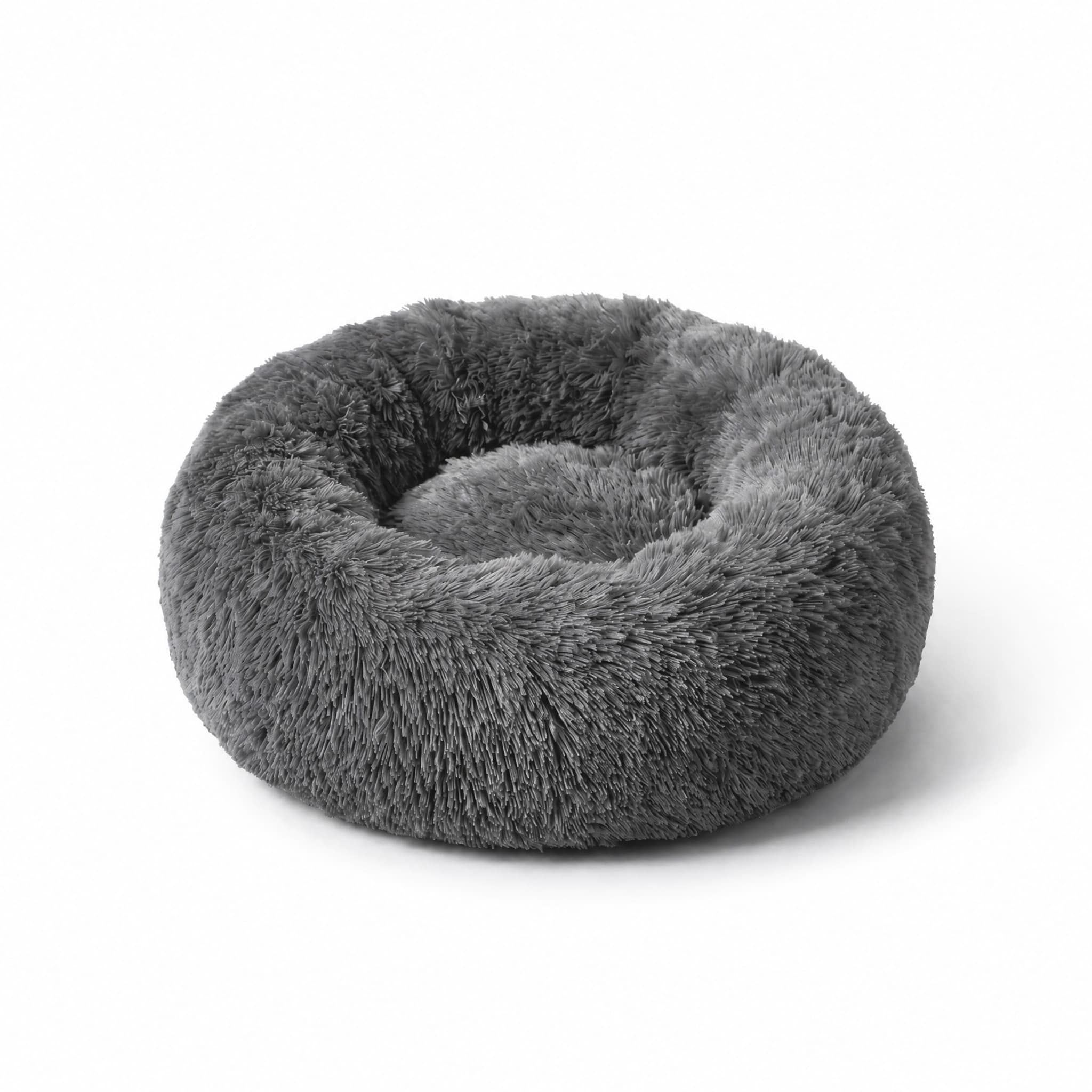 The CozyDen Calming Bed — a round grey plush shag donut pet bed with a deep centre crevice and raised bolster rim